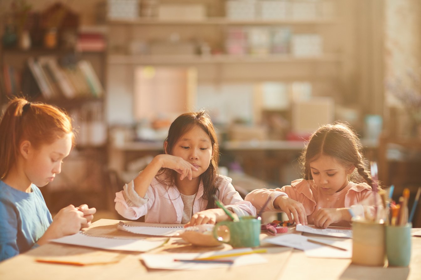 Children Painting in Sunlight